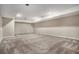 Finished basement with carpet, recessed lighting, and neutral paint at 2404 Caneridge, Marietta, GA 30064