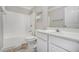 Bright bathroom features a shower-tub combo and single vanity at 2404 Caneridge, Marietta, GA 30064