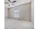 Neutral bedroom with bright window, ceiling fan, and plush carpet at 2404 Caneridge, Marietta, GA 30064