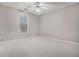 Inviting bedroom features a ceiling fan and neutral walls and carpet at 2404 Caneridge, Marietta, GA 30064