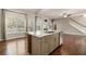 Kitchen with island and sink, granite countertops, and hardwood floors at 2404 Caneridge, Marietta, GA 30064