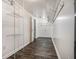 Spacious walk-in closet with wood-look flooring and white shelving at 2404 Caneridge, Marietta, GA 30064