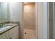 Updated bathroom featuring granite countertop vanity and a tiled walk-in shower at 3645 Larkspur Ter, Decatur, GA 30032