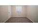 Simple bedroom with neutral carpet and a window at 3645 Larkspur Ter, Decatur, GA 30032