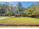 Charming single-story home features a well-manicured lawn and a welcoming walkway at 3645 Larkspur Ter, Decatur, GA 30032