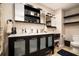 A bathroom with a double vanity and a frosted glass cabinet at 3501 Roswell Ne Rd # 211, Atlanta, GA 30305