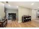 Bedroom area with multiple monitors and laminate wood flooring at 3501 Roswell Ne Rd # 211, Atlanta, GA 30305