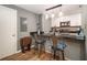 A stylish kitchen with stainless steel appliances and room for seating at 3501 Roswell Ne Rd # 211, Atlanta, GA 30305