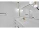 Modern bathroom featuring a sleek vanity with gold fixtures and ample countertop space at 195 Hope Hollow Rd, Loganville, GA 30052