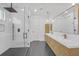 Contemporary bathroom showcasing a double vanity, a glass shower, and modern fixtures at 195 Hope Hollow Rd, Loganville, GA 30052