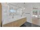 Modern bathroom with a double sink vanity, large mirror, and sleek fixtures at 195 Hope Hollow Rd, Loganville, GA 30052