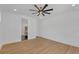 Light and airy bedroom featuring wood floors, recessed lighting, a ceiling fan, and large windows at 195 Hope Hollow Rd, Loganville, GA 30052