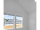 Bright bedroom featuring natural light, crisp white walls, and outdoor scenery at 195 Hope Hollow Rd, Loganville, GA 30052