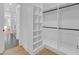 Spacious walk-in closet with custom shelving and ample storage space, offering organization at 195 Hope Hollow Rd, Loganville, GA 30052