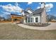 Beautiful home featuring an outdoor covered parking area and a well-manicured yard at 195 Hope Hollow Rd, Loganville, GA 30052