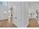 Hallway leading to an open-concept living space with modern finishes at 195 Hope Hollow Rd, Loganville, GA 30052
