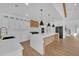 Modern kitchen featuring an island, stainless steel appliances, and bright white cabinetry at 195 Hope Hollow Rd, Loganville, GA 30052