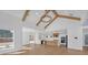 Open layout with wood floors, high ceilings, and a modern kitchen at 195 Hope Hollow Rd, Loganville, GA 30052
