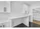 Well-designed mud room with built-in cubbies and bench, offering ample storage and a seamless transition indoors at 195 Hope Hollow Rd, Loganville, GA 30052