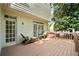 Back deck featuring comfortable seating and access to backyard at 535 Woodbrook Way, Lawrenceville, GA 30043