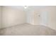 Neutral bedroom featuring carpeted floors, a ceiling fan and closet at 535 Woodbrook Way, Lawrenceville, GA 30043