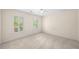 Neutral bedroom featuring shuttered windows allowing ample natural light at 535 Woodbrook Way, Lawrenceville, GA 30043