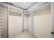 Walk-in closet with custom shelving and plenty of storage space at 535 Woodbrook Way, Lawrenceville, GA 30043