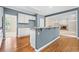 View of the kitchen island and the living room in the house at 535 Woodbrook Way, Lawrenceville, GA 30043