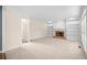 Spacious living room with a brick fireplace, built-in shelving, and bright windows at 535 Woodbrook Way, Lawrenceville, GA 30043