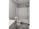 Bathroom featuring a modern vanity and tub at 4080 Brushymill Ct, Loganville, GA 30052