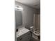 Bathroom featuring a modern vanity, shower and toilet at 4080 Brushymill Ct, Loganville, GA 30052