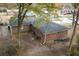 Home featuring a well-maintained backyard and mature trees creating a peaceful atmosphere at 679 Winchester Ln, Norcross, GA 30071