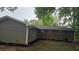 Exterior backyard features brick and siding combination and a nice yard space at 679 Winchester Ln, Norcross, GA 30071