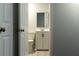 Neutral bathroom with vanity and modern fixtures and hardware at 679 Winchester Ln, Norcross, GA 30071
