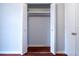 Open closet with bi-fold doors and shelving at 679 Winchester Ln, Norcross, GA 30071