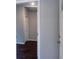 Hallway with hardwood floors and white doors at 679 Winchester Ln, Norcross, GA 30071