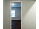 Hallway leading to a room filled with natural light, creating an inviting space at 679 Winchester Ln, Norcross, GA 30071