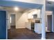 Updated kitchen features white cabinets, stainless steel appliances, and modern finishes at 679 Winchester Ln, Norcross, GA 30071