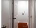 Laundry room with an open doorway and visible hookups and wood-look floors at 679 Winchester Ln, Norcross, GA 30071
