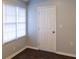 Bright room with natural light coming through the window, featuring a white door at 679 Winchester Ln, Norcross, GA 30071