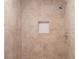 Walk-in shower featuring neutral tile and a built-in niche for toiletries at 679 Winchester Ln, Norcross, GA 30071