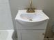 Bathroom vanity with modern gold faucet and white ceramic sink at 1148 Briarcliff Ne Rd # 1, Atlanta, GA 30306