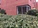 Exterior view of a brick building, with greenery in front of the window at 1148 Briarcliff Ne Rd # 1, Atlanta, GA 30306