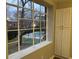 Kitchen window with a view of the community pool at 1148 Briarcliff Ne Rd # 1, Atlanta, GA 30306