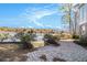 Lakeside backyard with mature trees; idyllic spot to relax and enjoy nature at 2220 Emerald Dr, Jonesboro, GA 30236