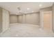Finished basement featuring recessed lighting and sleek marble flooring; lots of potential at 2220 Emerald Dr, Jonesboro, GA 30236