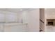 Finished basement includes wet bar and a brick fireplace creating a cozy space at 2220 Emerald Dr, Jonesboro, GA 30236