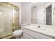 Bathroom with shower and a vanity with drawers and a large mirror at 2220 Emerald Dr, Jonesboro, GA 30236