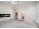 Expansive bedroom with a fireplace, carpet floors and access to the bathroom at 2220 Emerald Dr, Jonesboro, GA 30236