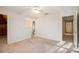 This bedroom offers a cozy retreat with neutral carpet and a unique view of the outside at 2220 Emerald Dr, Jonesboro, GA 30236